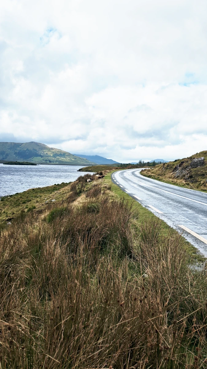 R344 road through the Inagh Valley beside Lough Inagh in Connemara, Ireland